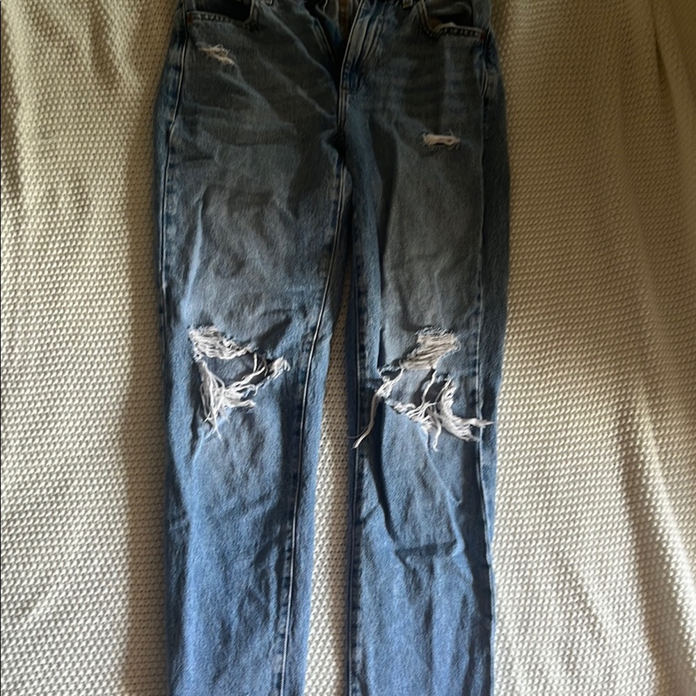 Distressed Blue Jeans
